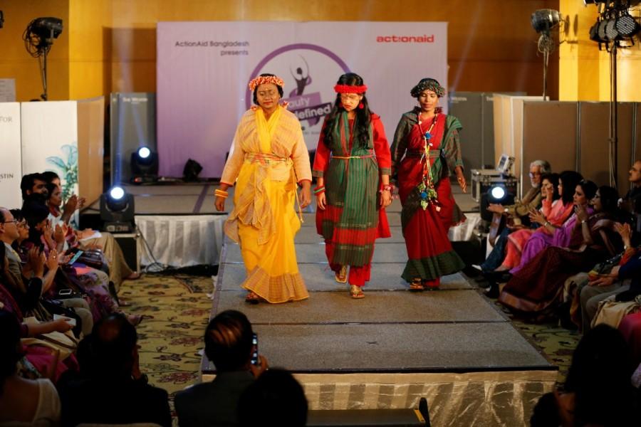 Acid attack survivors walk on the catwalk. Sonali Khatun, 13, who had acid thrown on her face when she was just 17 days old over a family property dispute, led the parade. She spent almost three years in hospital undergoing eight operations but never gave up hope of living a full life. "I want to be a doctor," the told the audience, which was spontaneously cheering and clapping. Women's Day,Women's Day special,Acid attack survivors walk the fashion runway,Acid attack walks the ramp,International Women's Day,acid attacks,fashion show