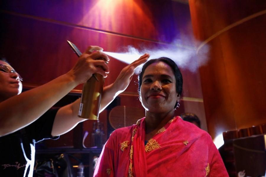 An acid attack survivor has her makeup done backstage. Women's Day,Women's Day special,Acid attack survivors walk the fashion runway,Acid attack walks the ramp,International Women's Day,acid attacks,fashion show