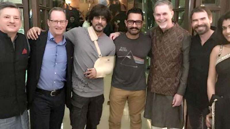 Bollywood superstars Shah Rukh Khan and Aamir Khan spent some Khan time together with a global internet TV network Netflix's CEO Reed Hastings and his team on Saturday night. Shah Rukh and Hastings posted a photograph where the Bollywood actors and Netflix team posed for the shutterbugs. "Netflixed and chilled. Thanks Reed Hastings, Ted Sarandos and team and my friend Aamir Khan for breaking his regimen for me," Shah Rukh tweeted on Sunday. The official handle of Netflix India also shared the image and posted: "Saturday night got pretty Khantastic". Shah Rukh,Aamir Khan,Shah Rukh and Aamir Khan,Shah Rukh Khan,Netflix CEO,Khantastic,Netflix's CEO
