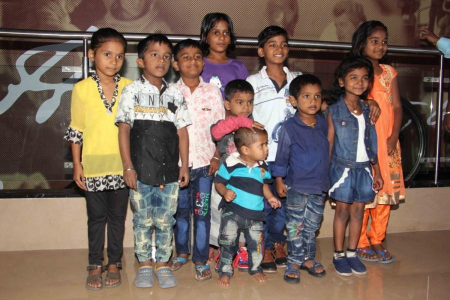 Bollywood actor Sunny Pawar with his friends and family members during the special screening of film Lion in Mumbai on March 11, 2017. Sunny Pawar,Sunny Pawar at Lion special screening,Lion special screening,Lion special screening pics,Lion special screening images,Lion special screening photos,Lion special screening stills,Lion special screening pictures