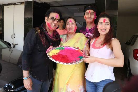 Bollywood actor Govinda celebrates Holi festival with Family.