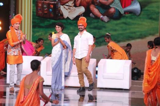 Bollywood actor Aamir Khan with his wife and filmmaker Kiran Rao on the sets of Marathi talk show Chala Hawa Yeu Dya in Mumbai on March 14, 2017. Aamir also celebrated his 52 birthday on the sets of the talk show.
