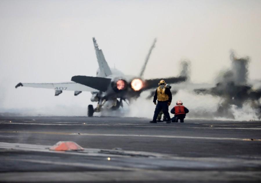 A U.S. Navy F18 fighter jet takes off from the deck of U.S. aircraft carrier USS Carl Vinson during an annual joint military exercise called "Foal Eagle" between South Korea and U.S., in the East Sea, South Korea. U.S. aircraft,U.S. aircraft joins South Korea,South Korea drills,U.S.-South Korean drills,merciless,North Korea,North Korea warns the United States,Navy F18,U.S. Navy F18