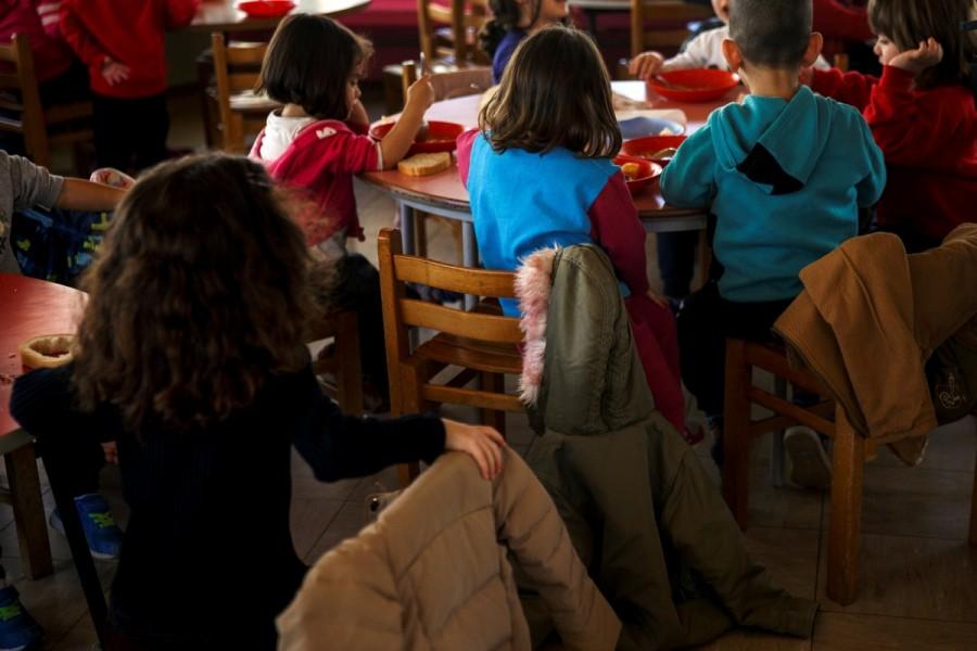 Children have bean soup for lunch at the Model National Nursery of Kallithea. Dozens of other children, all aged two to five, come in daily, but the days away from their parents are long. "We had incidents where children even attempted to leave, to run away, to go to their mother," Zervaki said. Impoverished Greek,Greek,group homes,economic crisis