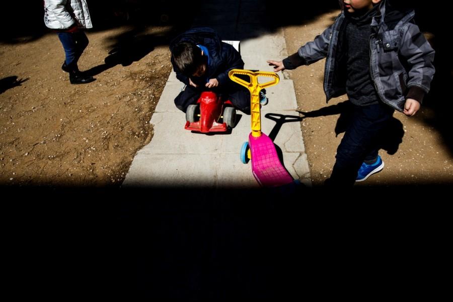 Children play in the yard of the Model National Nursery of Kallithea, in Athens. It is perhaps the darkest sign of economic devastation in Greece, where traditionally strong family ties are starting to crumble after years of depression. Impoverished Greek,Greek,group homes,economic crisis