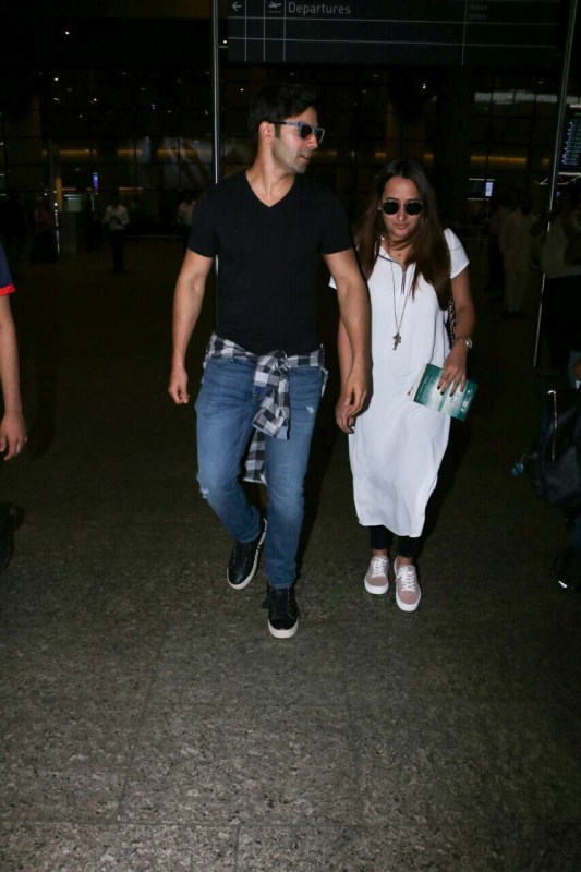 Bollywood actor Varun Dhawan and his girlfriend Natasha spotted at Airport. Varun Dhawan,Varun Dhawan and Natasha,Natasha,Varun Dhawan pics,Varun Dhawan images,Varun Dhawan photos,Varun Dhawan stills,Varun Dhawan pictures