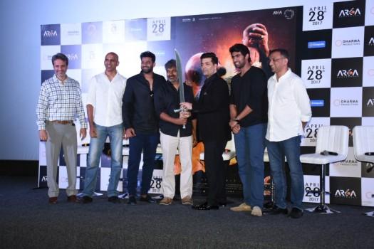 Presenting yet another tease to the mystery of Baahubali's death at the hands of the loyal Kattapa, director SS Rajamouli displayed the iconic sword and handed over the same to producer Karan Johar during the event.