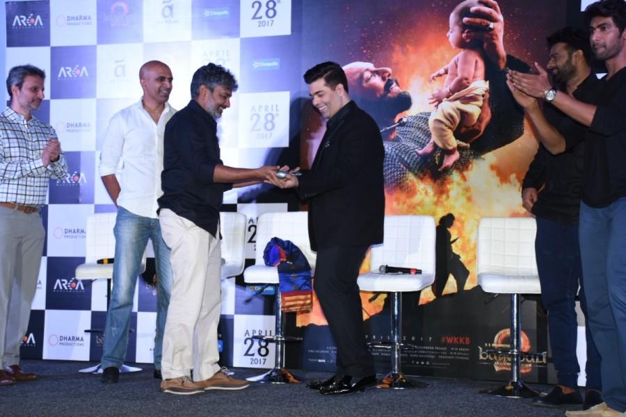 In 2015, southern producers Shobu Yarlagadda and Prasad Devineni and Bollywood director Karan Johar joined forces to present to the Indian audience an Indian cinematic experience, that was Baahubali. SS Rajamouli,Kattapa,Kattapa sword,Karan Johar,Baahubali,Baahubali 2,Baahubali 2 trailer launch,Baahubali 2 trailer,Baahubali 2 trailer launch pics,Baahubali 2 trailer launch images,Baahubali 2 trailer launch photos,Baahubali 2 trailer launch stills,Baahu
