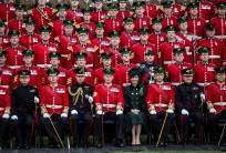 Britain's Prince William and Catherine, the Duchess of Cambridge, sit for an official photograph with warrant officers of the 1st Battalion Irish Guards following their St Patrick's Day parade at Cavalry Barracks, Hounslow on Friday, 17th March 2017.