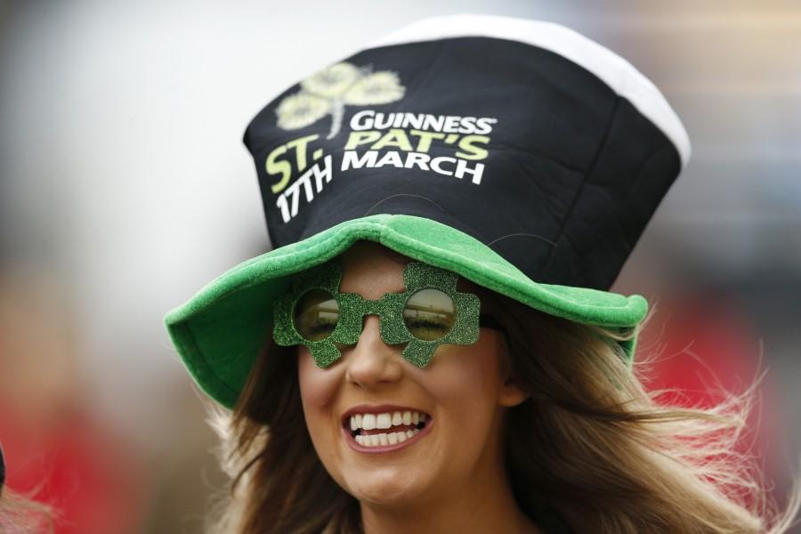 Racegoer in St Patrick's Day fancy dress during the Cheltenham Festival St Patrick’s Day,St Patrick’s Day 2017,St Patrick’s Day photos,irish holiday,St Patrick’s Day holiday,people celebrate St Patrick’s Day,St Patrick’s Day green,photos,Duchess of Cambridge,prince william,Catherine,St Patrick’s Day parade