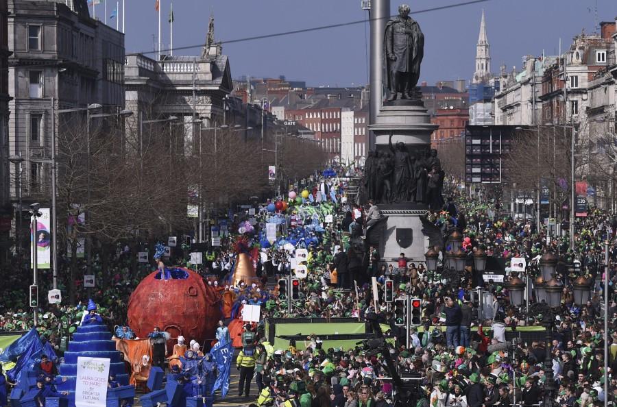People watch the parade St. Patrick's day in Dublin, Ireland March 17, 2016 St Patrick’s Day,St Patrick’s Day 2017,St Patrick’s Day photos,irish holiday,St Patrick’s Day holiday,people celebrate St Patrick’s Day,St Patrick’s Day green,photos,Duchess of Cambridge,prince william,Catherine,St Patrick’s Day parade