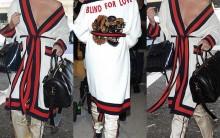 Hollywood actress Chrissy Teigen suffers wardrobe malfunction in Gucci outfit.