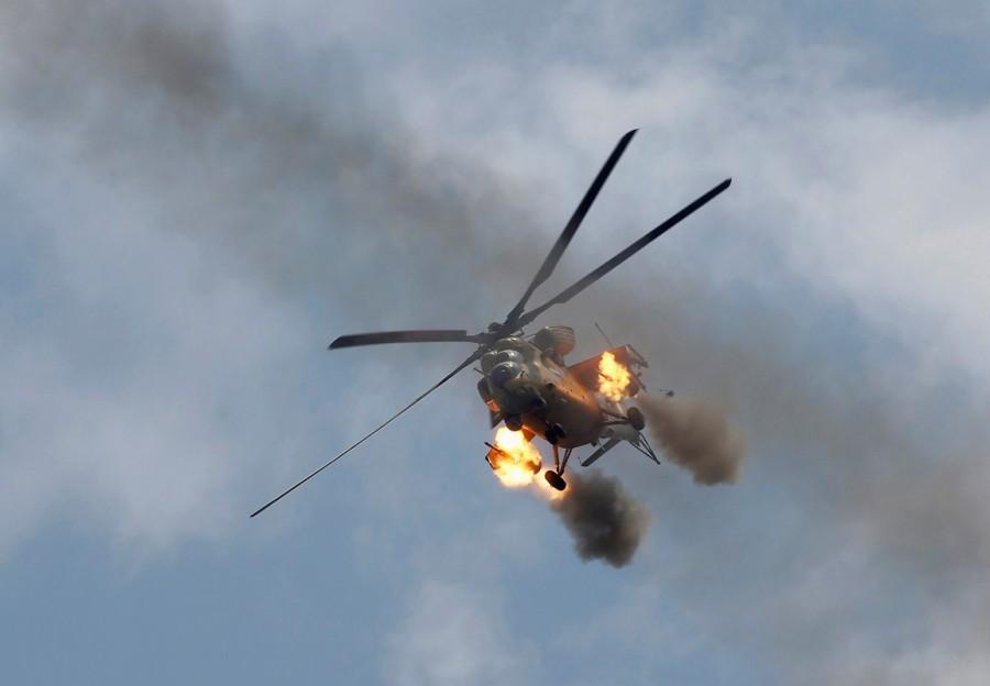 An Iraqi Air Force helicopter fires missiles against Islamic State militants during a battle in Mosul. Iraqi forces,Mosul,Iraqi forces edge further into Mosul,Iraqi forces attack,Iraqi Air Force