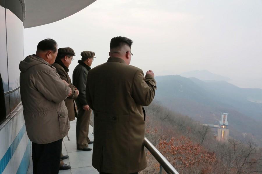 North Korean leader Kim Jong Un watched the ground jet test of a Korean-style high-thrust engine newly developed by the Academy of the National Defence Science in this undated picture provided by KCNA in Pyongyang on March 19, 2017. North Korea,secretive missile program,missile program,North Korea's secretive missile program,North Korea missile program,North Korea missile program pics,North Korea missile program images,North Korea missile program photos,North Korea missile progr