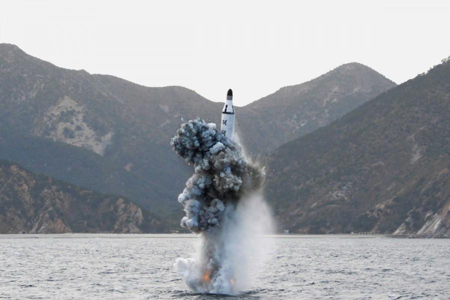 North Korean leader Kim Jong Un guides on the spot the underwater test-fire of strategic submarine ballistic missile. North Korea,secretive missile program,missile program,North Korea's secretive missile program,North Korea missile program,North Korea missile program pics,North Korea missile program images,North Korea missile program photos,North Korea missile progr