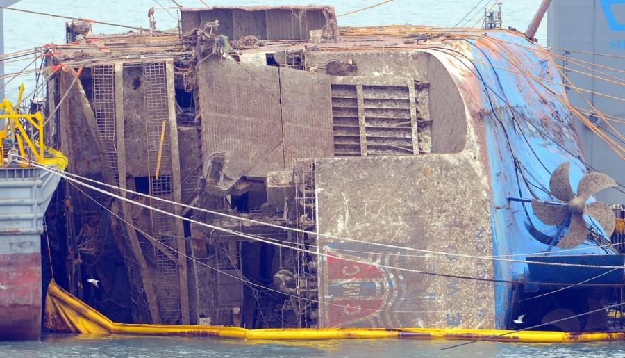 The sunken ferry Sewol is seen during its salvage operations at the sea off Jindo, South Korea, March 24, 2017. Sunken South Korea,South Korea ferry raised,South Korea ferry,Sewol ferry,Sewol ferry sank,Sewol ferry salvage,sewol ferry disaster