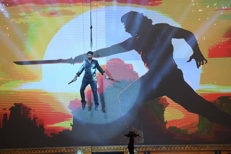 Baahubali 2: The Conclusion movie Pre Release event held at Ramoji Film City in Hyderabad. Actor Prabhas spotted suring the event. Prabhas at Baahubali 2,Prabhas Baahubali 2,Baahubali 2 movie pre-release event,Baahubali 2 pre-release event,Baahubali 2 pre-release event pics,Baahubali 2 pre-release event images,Baahubali 2 pre-release event stills,actor Prabhas,Prabhas pics,Prabhas im