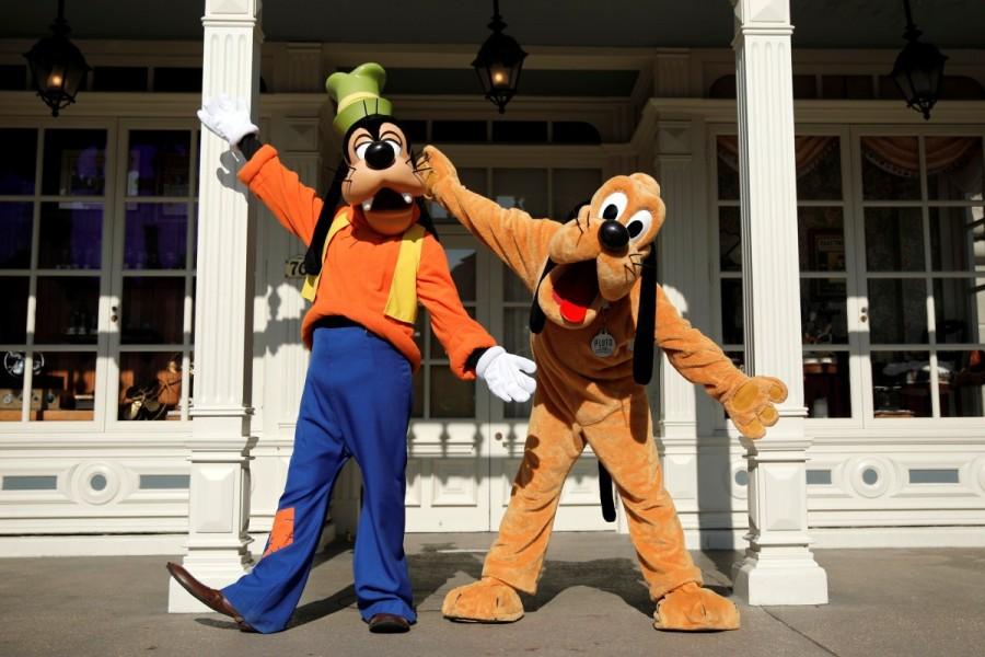 Disney characters Goofy and Pluto pose for photos in Disneyland Paris. Disneyland Paris,Disneyland,Disney Stars,Disneyland Paris turns 25,25th anniversary of Disneyland Paris,Disneyland Paris 25