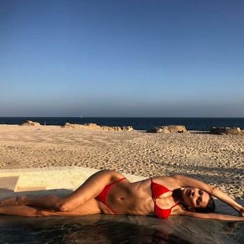 Hollywood actress Bella Hadid flaunts her toned figure in red hot bikini.