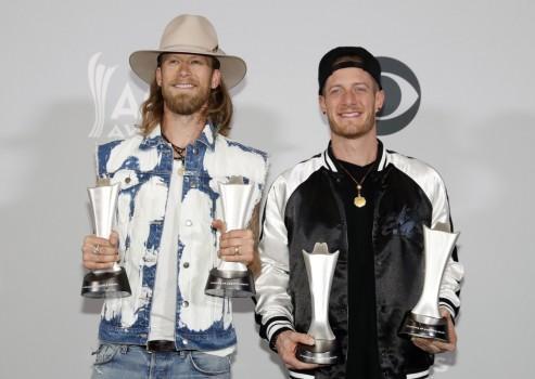 Florida Georgia Line poses backstage with their Single Record of the Year award for H.O.L.Y. and Vocal Event of the Year for 