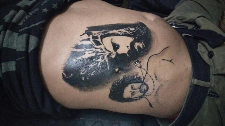 Baahubali actor Prabhas recently had a fan get his image inked on himself. The young fan got a tattoo dedicated to Prabhas' iconic Baahubali character. The tattoo consists of a combination of Prabhas' two characters in the film, that of Shivudu and Amrendra Baahubali. The young fan went to the extent of getting a 10-inch tattoo of the actor imprinted on his body. Prabhas,Prabhas fans,Prabhas fan,Baahubali tattooed,Baahubali,Baahubali tattooe,Amrendra Baahubali,Shivudu