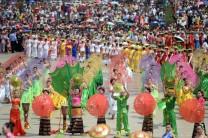 Local residents perform at the opening ceremony of the water-sprinkling festival