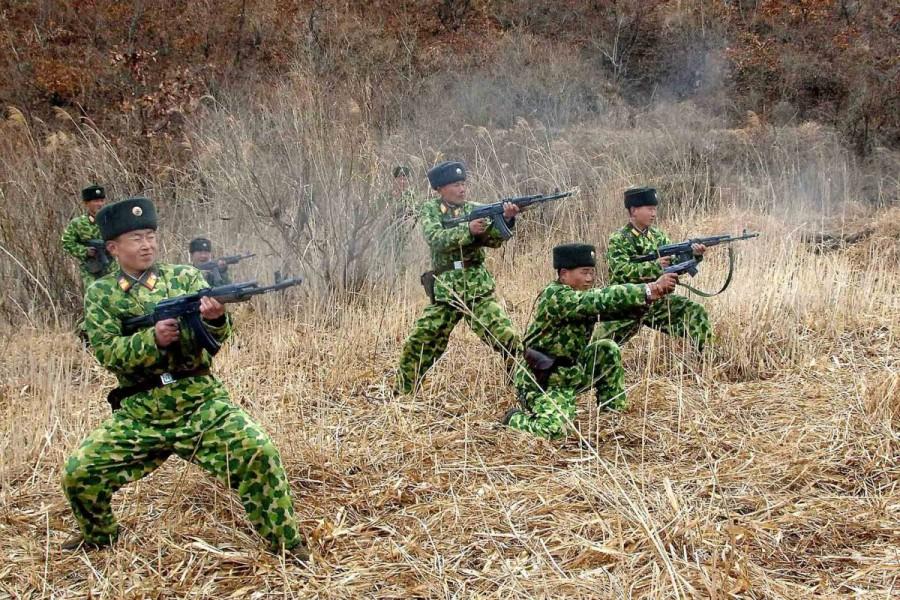 North Korean soldiers with weapons attend military training in an undisclosed location. North Korean military,North Korean,Korean People,Korean People Army