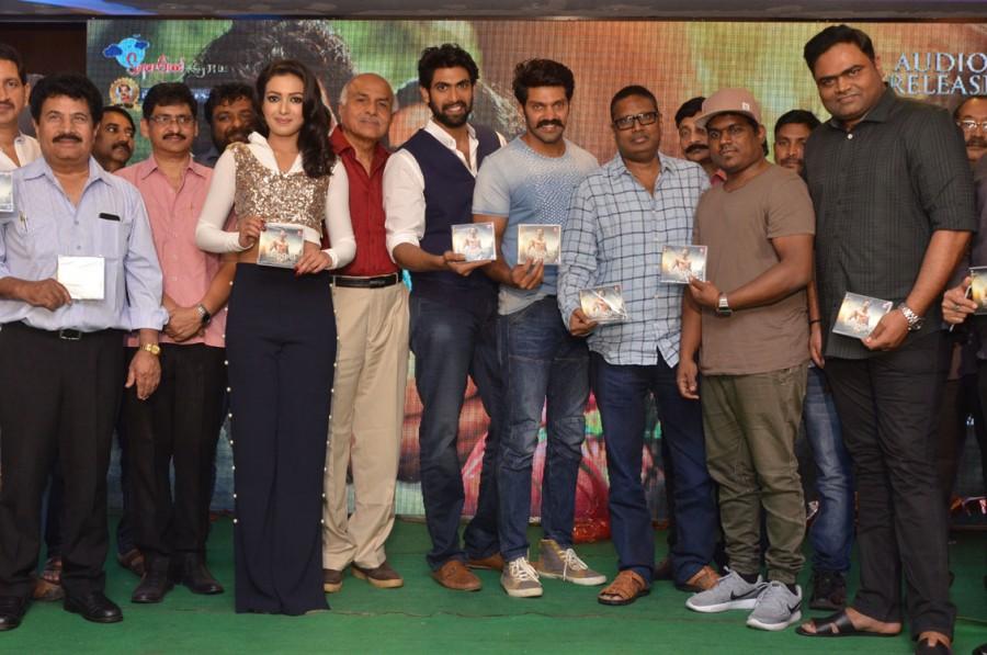 Telugu movie Gajendrudu audio launch event held at Hyderabad. Celebs like Arya, Catherine Tresa, Rana Daggubati, Yuvan Shankar Raja, RB Choudary, Vamsi Paidipally, Ragava, K Atchi Reddy, SV Krishna Reddy, Vamsy, Bhimaneni Srinivasa Rao, NV Prasad, Gunasekhar, Manjusha and others graced the event. Arya,Catherine Tresa,Rana Daggubati,Yuvan Shankar Raja,RB Choudary,Vamsi Paidipally,Ragava,Gajendrudu,Gajendrudu audio launch,Gajendrudu audio launch pics,Gajendrudu audio launch images,Gajendrudu audio launch photos,Gajendrudu audio launch stills,Gajendr