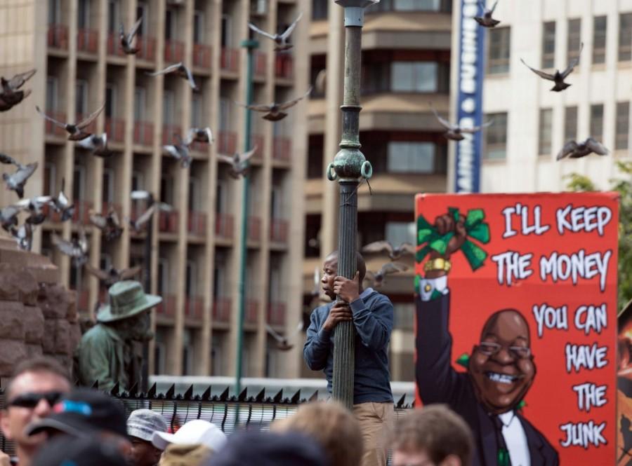 Demonstrators take part in a protest calling for the removal of South Africa's President Jacob Zuma, in Pretoria, South Africa April 7, 2017. South Africans protest,South African,President Zuma,Johannesburg,Jacob Zuma,cabinet reshuffle