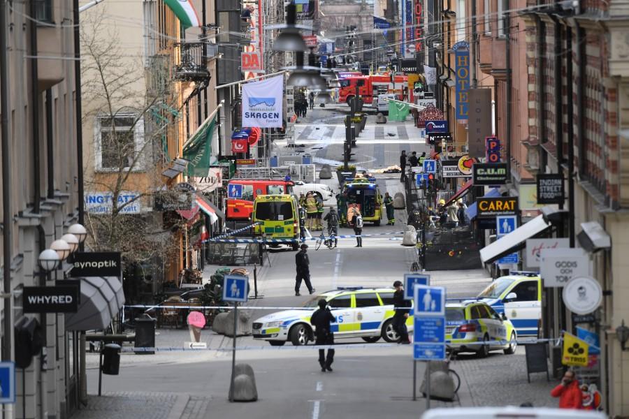 A view of the street scene after people were killed when a truck crashed into a department store Ahlens, in central Stockholm, Sweden, April 7, 2017. Truck drives,Sweden,shopping street,Stockholm,Truck drives into crowd in Sweden,Truck drives into crowd