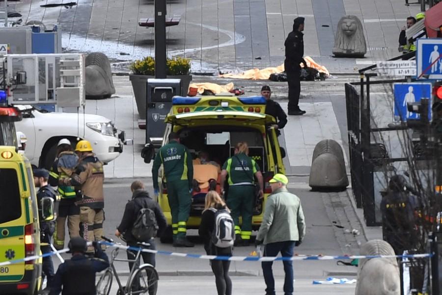 People were killed when a truck crashed into department store Ahlens on Drottninggatan, in central Stockholm, Sweden April 7, 2017. Truck drives,Sweden,shopping street,Stockholm,Truck drives into crowd in Sweden,Truck drives into crowd