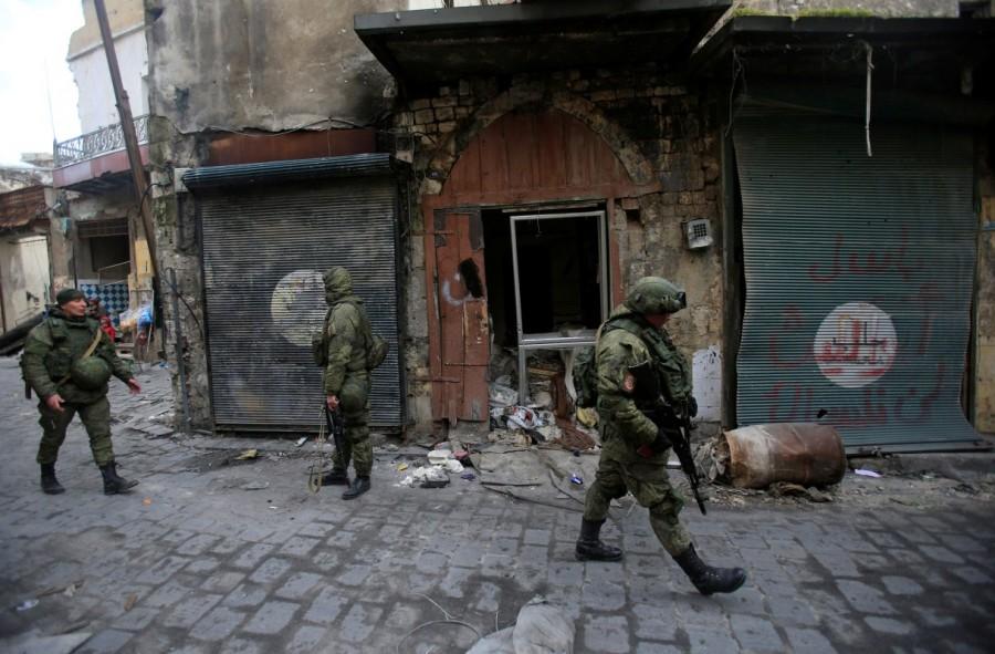 Russian soldiers walk in the Old City of Aleppo, January 2017. Russian forces in Syria,Russian forces,Syria,war on Assad,Russia,Syrian government