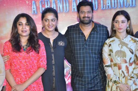 Tamil movie Baahubali 2 audio launch event held at Chennai. Celebs like Prabhas, Anushka Shetty, Tamannaah, SS Rajamouli, Sathyaraj, Ramya Krishnan, Nassar, Rama Rajamouli, MM Keeravani, Srivalli Keeravaani, K Raghavendra Rao, Keyaar, RK Suresh, RJ Balaji, Dhananjayan, Rajesh M Selva, Nirosha, Ramki, Dhanush, Kalaipuli S Thanu, Kabilan Vairamuthu, Madhan Karky, Yuvan Shankar Raja, Krishna Kulasekaran and others graced the event.