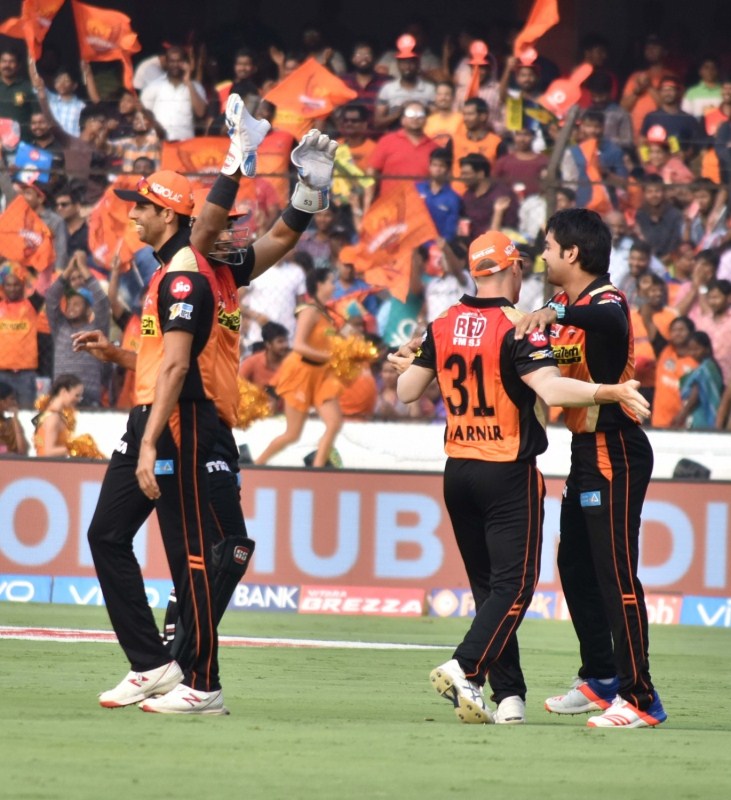 Leg-spinner Rashid Khan (3/19) and seamer Bhuvneshwar Kumar (2/21) put up impressive bowling performances to help Sunrisers Hyderabad (SRH) outplay Gujarat Lions (GL) by nine wickets and register their second consecutive win in the Indian Premier League (IPL) here on Sunday. Thanks to the heroics of 19-year-old Afghan slow bowler Rashid and India medium pacer Bhuvneshwar, the defending champions restricted Gujarat Lions (GL) to a low total of 135/7 at the Rajiv Gandhi International Stadium. The target never appeared a challenge for the hosts, who rode on pyrotechnics from captain David Warner (76 not out off 45 deliveries) and Moises Henriques (52 not out off 39 balls) to maul the inefficient and inexperienced Gujarat bowlers and give Hyderabad an easy victory with 4.3 overs to spare. Hyderabad,Gujarat,Rashid Khan,Bhuvneshwar Kumar,Sunrisers Hyderabad,Gujarat Lions,IPL,IPL 2017,Indian Premier League,Indian Premier League 2017
