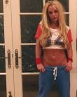 Britney Spears shows off her impressive abs and cheeky tattoos.