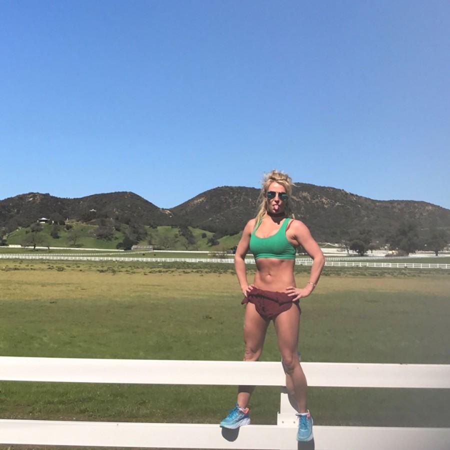 Britney Spears shows off her impressive abs and cheeky tattoos. Britney Spears,Britney Spears abs,Britney Spears cheeky tattoos,Britney Spears tattoos,Britney Spears bikini pics,Britney Spears bikini images,Britney Spears bikini stills,Britney Spears bikini pictures,Britney Spears hot pics,Britney Spears hot images,Br