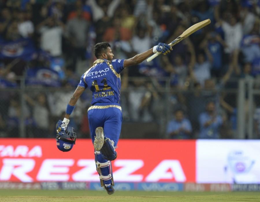 Dhawan, who by now had faced 16 balls for his seven runs, opened up with two fours and a six off Australian pacer Mitchell McClenagan as Hyderabad crossed the 50-run mark in the eighth over. Coming back for his second spell, Harbhajan's first ball was powerfully muscled over the third man boundary by a right-handed Warner for a mammoth six before the 36-year-old tweaker came back strongly the very next ball to dismiss the Aussie. Warner, who had faced 34 balls and struck seven boundaries and two sixes by then, got a top-edge while attempting another reverse-sweep as wicketkeeper Parthiv Patel dived full length to complete a stunning catch at short point. Two overs later, Harbhajan returned to bowl his final over and struck first ball with the wicket of Hooda (9), caught by Pollard at long-on. In the very next over, McClenaghan provided the vital breakthrough in the form of a set Dhawan, crashing his leg-stump with a full toss after the southpaw faced 43 balls and sent the ball five times to the fence and once over it. Mumbai Indians beat Sunrisers Hyderabad,Mumbai Indians,Sunrisers Hyderabad,IPL 2017,IPL,Indian Premier League,Indian Premier League 2017,Nitish Rana