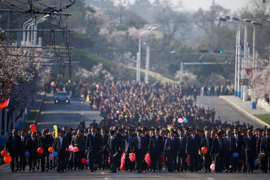 Thousands of people arrive for an opening ceremony of a newly constructed residential complex in Ryomyong street. North Korea,Pyongyang,Postcards from Pyongyang,Kim Il-sung,father Kim Il-sung