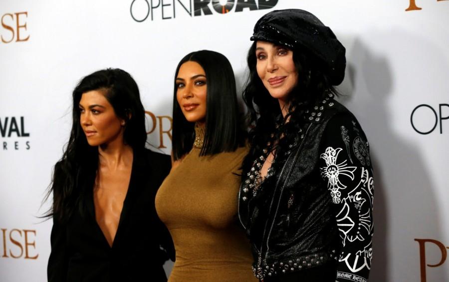 Singer Cher (R) poses with television personalities Kim Kardashian (C) and Kourtney Kardashian at the premiere of "The Promise" in Los Angeles, California. The Promise premiere show,The Promise,Kim Kardashian,Angela Sarafyan,Sylvester Stallone,The Promise premiere show pics,The Promise premiere show images,The Promise premiere show stills,The Promise premiere show pictures,The Promise premiere show photos