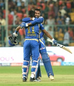 Kieran Pollards 70 runs in 47 deliveries helped Mumbai Indians withstand a fiery spell, including a hat-trick, from leg-spinner Samuel Badree as the visitors registered a four-wicket win over Royal Challengers Bangalore (RCB) to go top of the Indian Premier League (IPL) with six points here on Friday. In pursuit of RCB's 142/5, Mumbai had a horrendous start as Badree snared a hat-trick in the third over, removing Parthiv Patel (3), Mitchell McClanaghan (0) and Rohit Sharma (0) to plunge the visitors to 7/4, with opener Jos Buttler (2) already being dismissed by Stuart Binny in the second over. In the second ball of the West Indian leg-spinner Badree's second over, Parthiv offered a catch to Chris Gayle at short cover, while McClenaghan smashed a full toss into the hands of Mandeep Singh at long on. Facing the hat-trick ball, Mumbai captain Rohit Sharma couldn't tackle a googly which destroyed the stumps to mark Badree registering the 15th hat-trick in IPL history.