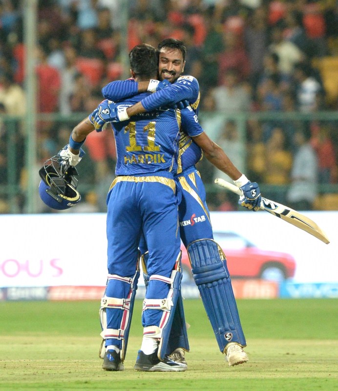 Kieran Pollards 70 runs in 47 deliveries helped Mumbai Indians withstand a fiery spell, including a hat-trick, from leg-spinner Samuel Badree as the visitors registered a four-wicket win over Royal Challengers Bangalore (RCB) to go top of the Indian Premier League (IPL) with six points here on Friday. In pursuit of RCB's 142/5, Mumbai had a horrendous start as Badree snared a hat-trick in the third over, removing Parthiv Patel (3), Mitchell McClanaghan (0) and Rohit Sharma (0) to plunge the visitors to 7/4, with opener Jos Buttler (2) already being dismissed by Stuart Binny in the second over. In the second ball of the West Indian leg-spinner Badree's second over, Parthiv offered a catch to Chris Gayle at short cover, while McClenaghan smashed a full toss into the hands of Mandeep Singh at long on. Facing the hat-trick ball, Mumbai captain Rohit Sharma couldn't tackle a googly which destroyed the stumps to mark Badree registering the 15th hat-trick in IPL history. Samuel Badree,Samuel Badree RCB,Samuel Badree hattrick,Kieron Pollard,Mumbai Indians stun Royal Challengers Bangalore,Mumbai Indians beats Royal Challengers Bangalore,Mumbai Indians,Royal Challengers Bangalore,RCB,MI,RCB vs MI,MI vs RCB
