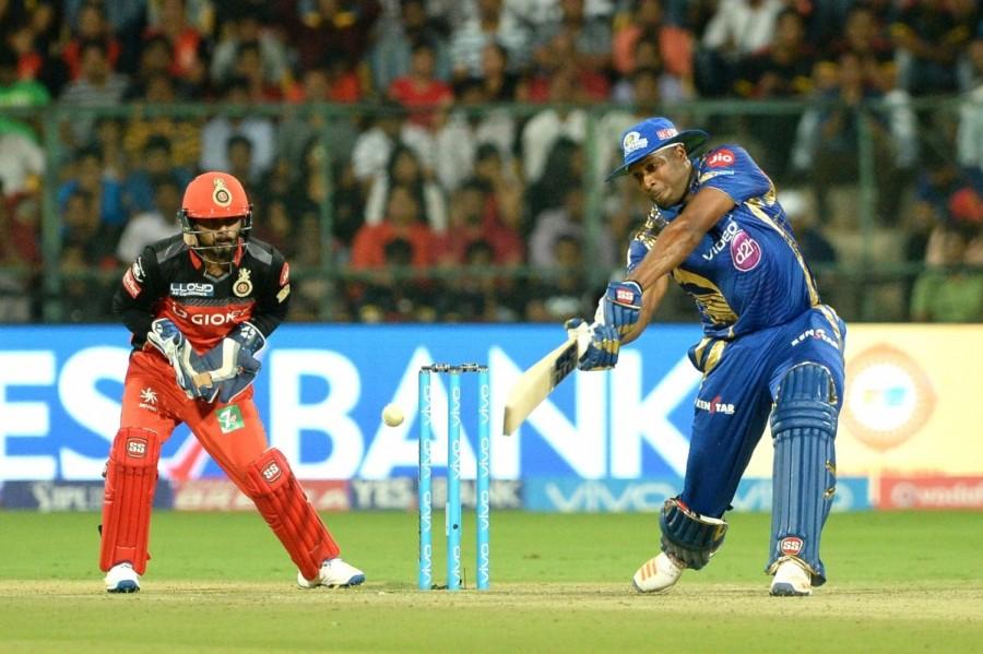 Badree didn't stop there. He got the wicket of Nitish Rana (11) to cast a huge doubt over RCB's hopes of overhauling the relatively small target. Overall, Badree gave away only nine runs in four overs at the Chinnaswamy Stadium. But after the end of the brilliant spell from Badree, Mumbai's seasoned all-rounder Pollard (70 off 47) kept his side afloat with a defiant knock. He dug his team out of the abyss with a 93-run sixth-wicket partnership with Krunal Pandya (37 not out off 30). Pollard's inning was studded with three fours and five sixes -- three off left-arm spinner Pawan Negi -- as he turned the match on his own. The partnership began slowly, the first focus being on weathering the storm. But as the pair spent some time together at the crease, they became showing their might. Samuel Badree,Samuel Badree RCB,Samuel Badree hattrick,Kieron Pollard,Mumbai Indians stun Royal Challengers Bangalore,Mumbai Indians beats Royal Challengers Bangalore,Mumbai Indians,Royal Challengers Bangalore,RCB,MI,RCB vs MI,MI vs RCB