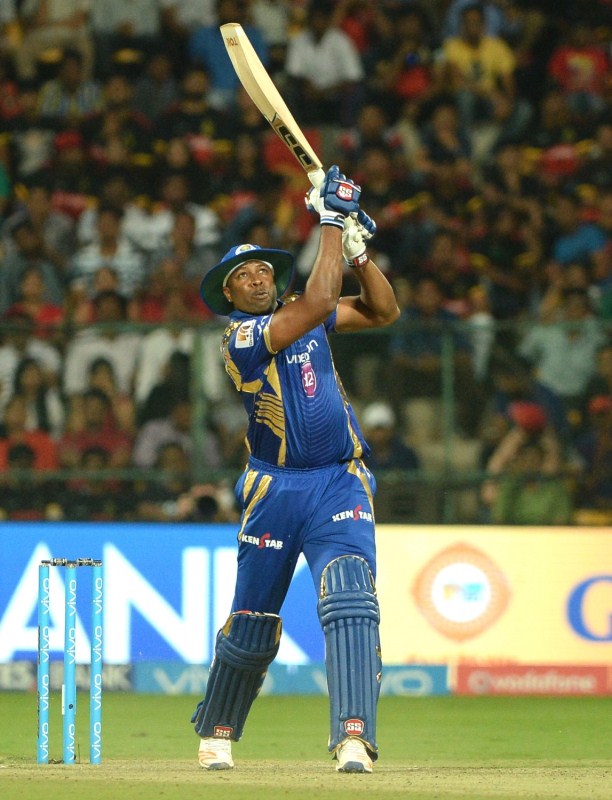 With 52 required off the final five overs, Pollard's two sixes over bowler Negi's head tilted the match in favour of Mumbai, who earned 19 runs from the over. In the following over, he deposited one into the stands off a ball from leg-spinner Yuzvender Chahal. However, the same over saw him being holed out by AB de Villers at the long-on boundary. But he had done the job, with Mumbai needing only 17 runs off 15 balls after Pollard's wicket. Later, Krunal and his brother Hardik saw their side home with four wickets and 1.1 overs to spare. Mumbai's chase was only possible as they had a small target to chase. They dished out a disciplined bowling show to restrict RCB to 142/5. Though Mumbai played without their experienced pacer Lasith Malinga, their other bowlers bowled to their potential as RCB wasted a solid start given by skipper Virat Kohli, Chris Gayle and de Villiers. The RCB thus got wrapped up under 150-run mark. Samuel Badree,Samuel Badree RCB,Samuel Badree hattrick,Kieron Pollard,Mumbai Indians stun Royal Challengers Bangalore,Mumbai Indians beats Royal Challengers Bangalore,Mumbai Indians,Royal Challengers Bangalore,RCB,MI,RCB vs MI,MI vs RCB