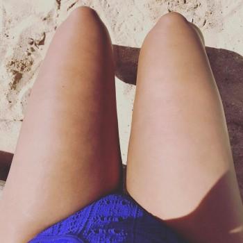 Demi Lovato flaunts her long legs.