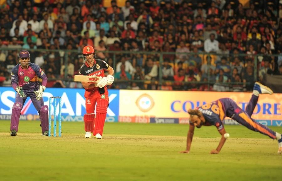 However, the competitive total could easily have been a match-winning one, thanks to the start they got from Tripathi (31) and Rahane (30), who posted 61 at the end of Powerplay overs (six). Both scored at a fair clip, Tripathi especially impressive with hitting three fours and a six against pacers Adam Milne and Sreenath Aravind. Rahane too looked fluent, timing the ball nicely as he hit five fours in his 30-run knock. Leg-spinner Samuel Badree broke the opening partnership as Rahane missed the length completely, allowing the ball to dismantle his stumps, with Pune at 63/1 in 7.4 overs. The following over, bowled by left-arm spinner Pawan Negi, saw Tripathi hitting straight at Virat Kohli at short cover. These two quick wickets brought Steven Smith and Dhoni to the middle and a partnership slowly flourished. Pune beat Bangalore,Rising Pune Supergiant,Royal Challengers Bangalore,Indian Premier League,Indian Premier League 2017,IPL,IPL 2017,Chinnaswamy stadium