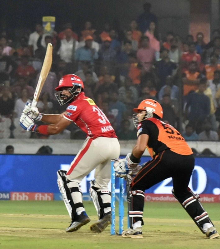 Warner, who was till then grinding out a 24-ball 20, was joined by Naman Ojha in the middle. Ojha decided to take the attack to the opposition and proved to be successful, especially against spinners Axar and K.C. Cariappa. During his 20-ball 34-run cameo, Ojha hit two fours and six to give some sort of thrust to the Hyderabad innings. The partnership between him and Warner provided 60 runs in just 6.1 overs. Warner mixed couple of fours with singles and twos to prop up the Hyderabad innings. But Cariappa got rid of Ojha as the batsman jumped down the track and completely missed the length only to be stumped by Saha. David Warner,Bhuvneshwar Kumar,Sunrisers Hyderabad,Kings XI Punjab,Hyderabad pip Punjab by 5 runs,Indian Premier League,Indian Premier League 2017,IPL,IPL 2017