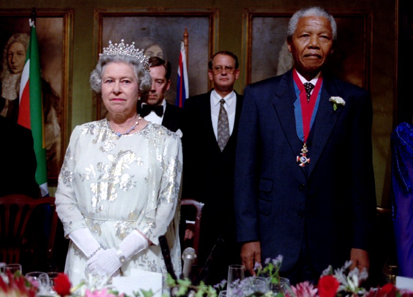 Britain's Queen Elizabeth II (L) and South African President Nelson Mandela listen to national anthems prior a banquet March 12. The Queen is in South Africa, the first to the country since 1947. England Queen,Queen Elizabeth II 91st birthday,Queen Elizabeth II,Queen Elizabeth II birthday,Queen Elizabeth II birthday special,Queen Elizabeth II rare pics,Queen Elizabeth II rare images,Queen Elizabeth II rare stills,Queen Elizabeth II rare pictures,Q