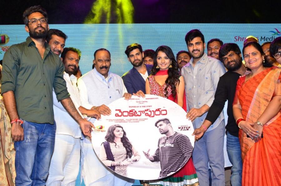 Telugu movie Venkatapuram audio launch event held at Hyderabad. Celebs like Rahul Dayakiran, Mahima Makwana, Vijay Devarakonda, Rahul Ravindran, G Laxma Reddy, Sharwanand, Venu Madikanti, Shreyas Srinivas, Phanikumar, Achu Rajamani, Sridhar Lagadapati, Maruthi graced the event. Venkatapuram audio launch,Venkatapuram audio,Rahul Dayakiran,Mahima Makwana,Vijay Devarakonda,Rahul Ravindran,G Laxma Reddy,Sharwanand,Venu Madikanti,Shreyas Srinivas,Venkatapuram audio launch pics,Venkatapuram audio launch images,Venkatapuram audio launc