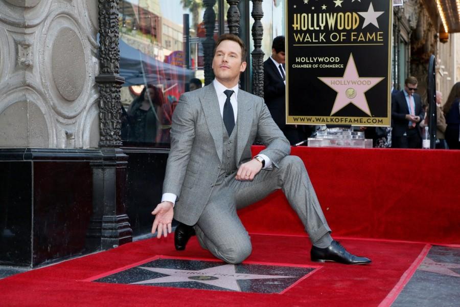 Actor Chris Pratt poses during a ceremony honoring him with a star on the Hollywood Walk of Fame in Hollywood, California. Chris Pratt,Chris Pratt gets Hollywood Walk of Fame,Hollywood Walk of Fame,Chris Pratt Walk of Fame,Chris Pratt pics,Chris Pratt images,Chris Pratt stills,Chris Pratt pictures,Chris Pratt photos