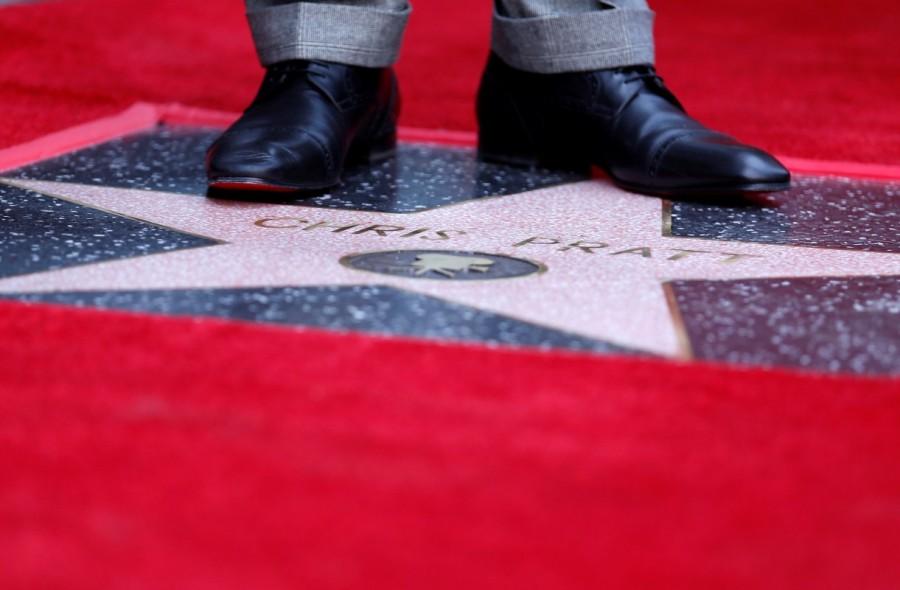 Actor Chris Pratt stands on his star. Chris Pratt,Chris Pratt gets Hollywood Walk of Fame,Hollywood Walk of Fame,Chris Pratt Walk of Fame,Chris Pratt pics,Chris Pratt images,Chris Pratt stills,Chris Pratt pictures,Chris Pratt photos